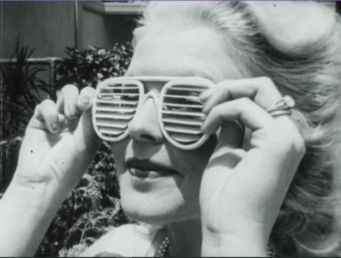 Truly odd montage of women and blinds