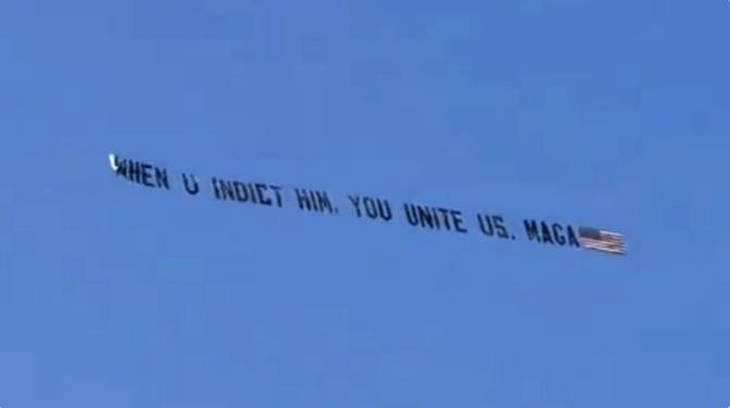 Aerial Banner Over Trump Trial in NYC Sparks Discussion: ‘WHEN U INDICT HIM YOU UNITE US. MAGA!’